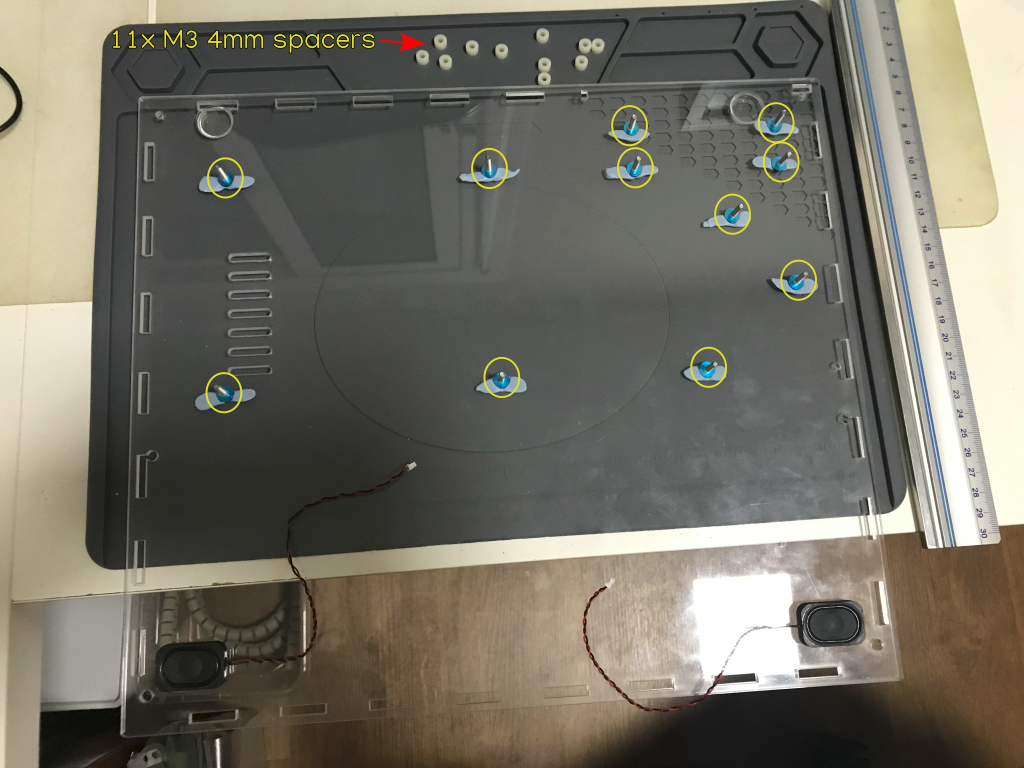 main-case-050-bottom-panel-turn-after-applying-blue-tak-to-screws-EN.png